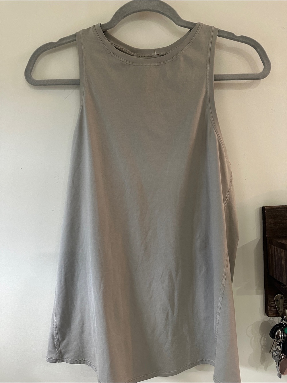 Free People Light khaki Sleeveless Crewneck Tank. Openings in back